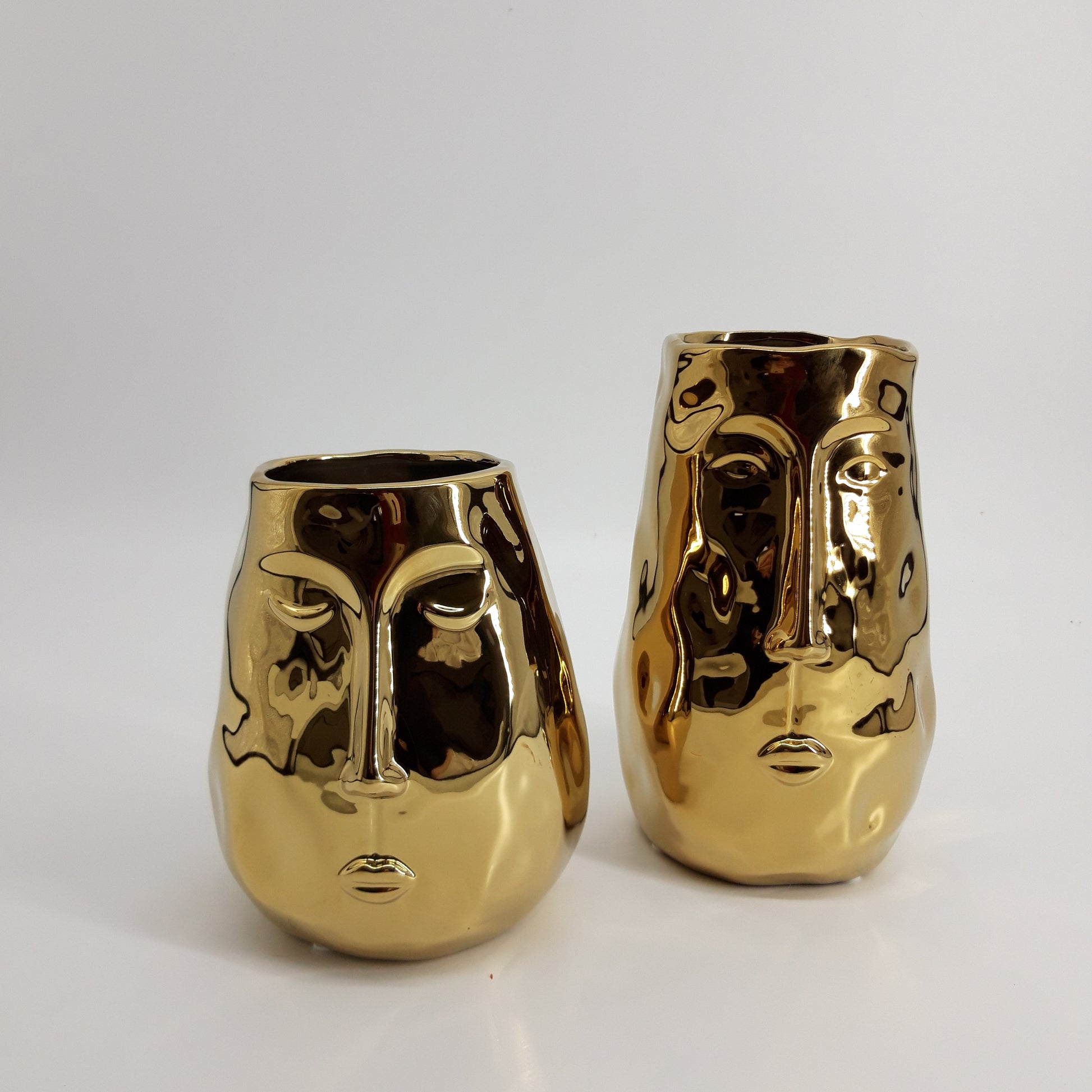 Gouden vaas met gezicht large